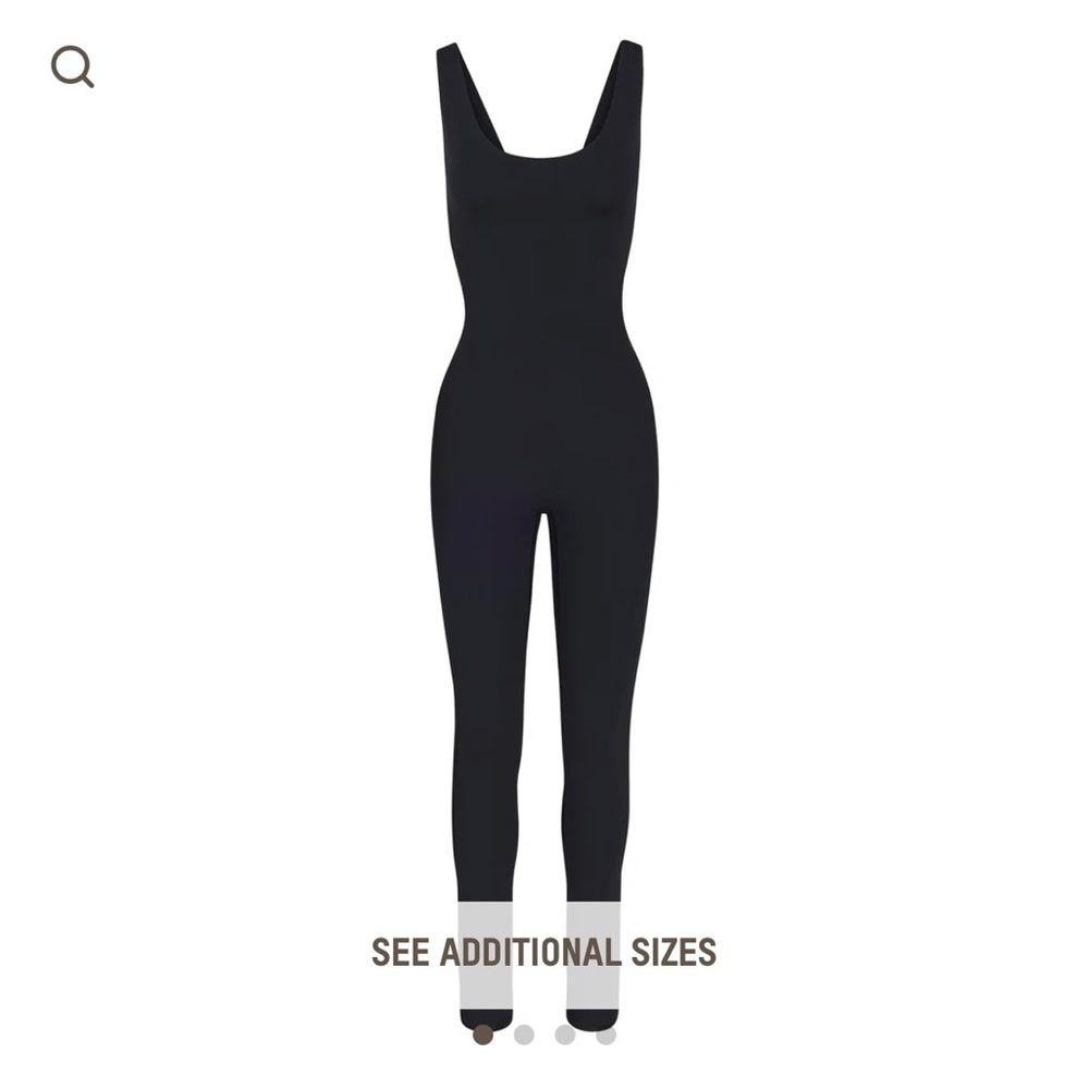 NWT - Skims all in one compression jumpsuit. Sz L. Color is onyx.
